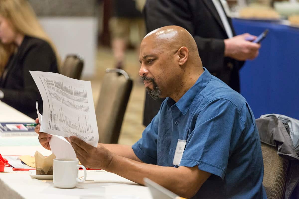 Looking through the program at the NRA Foundation's Annual National Firearms Law Seminar